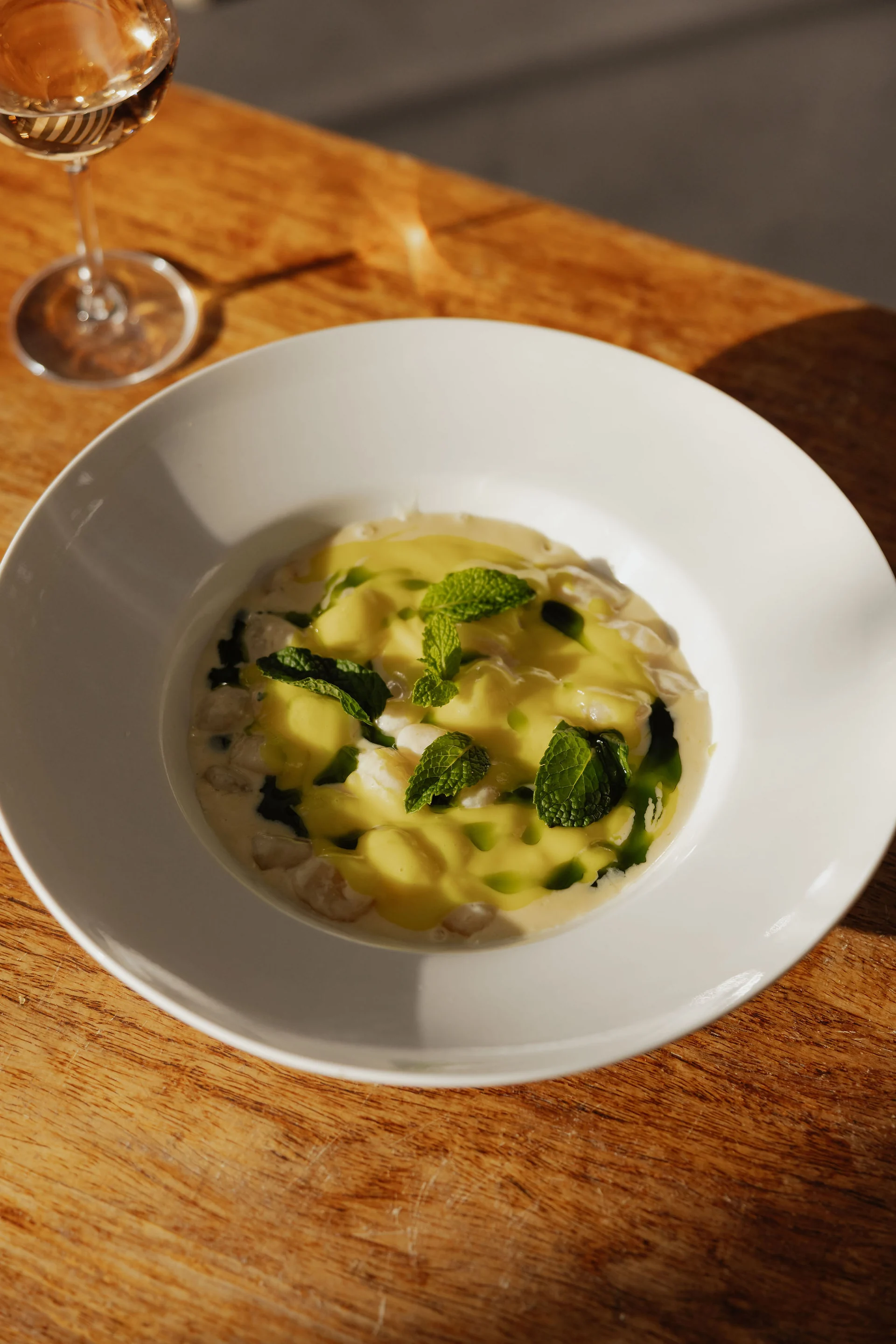 Homemade gnocchi in golden saffron sauce