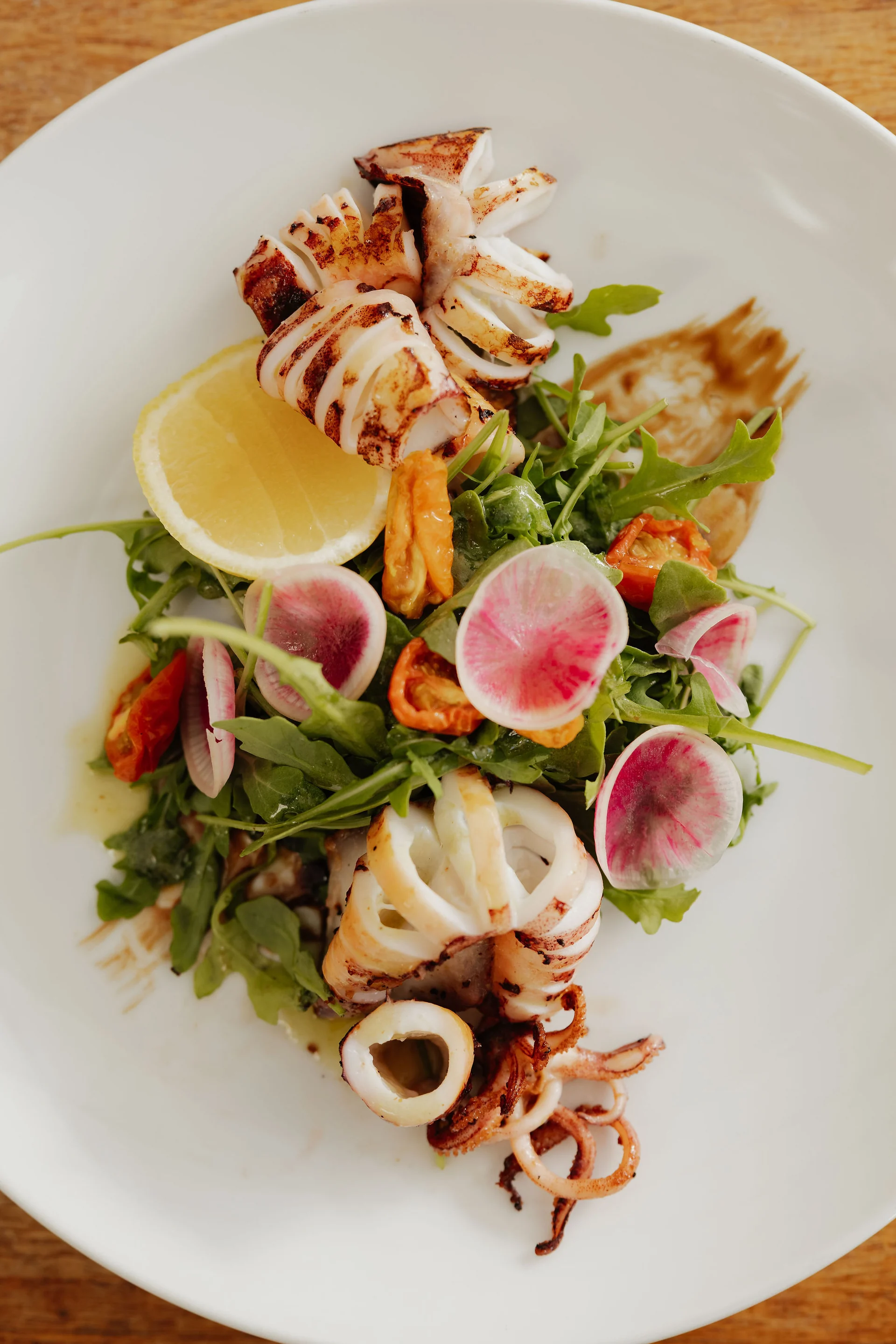 Calamari with a colourful fresh salad